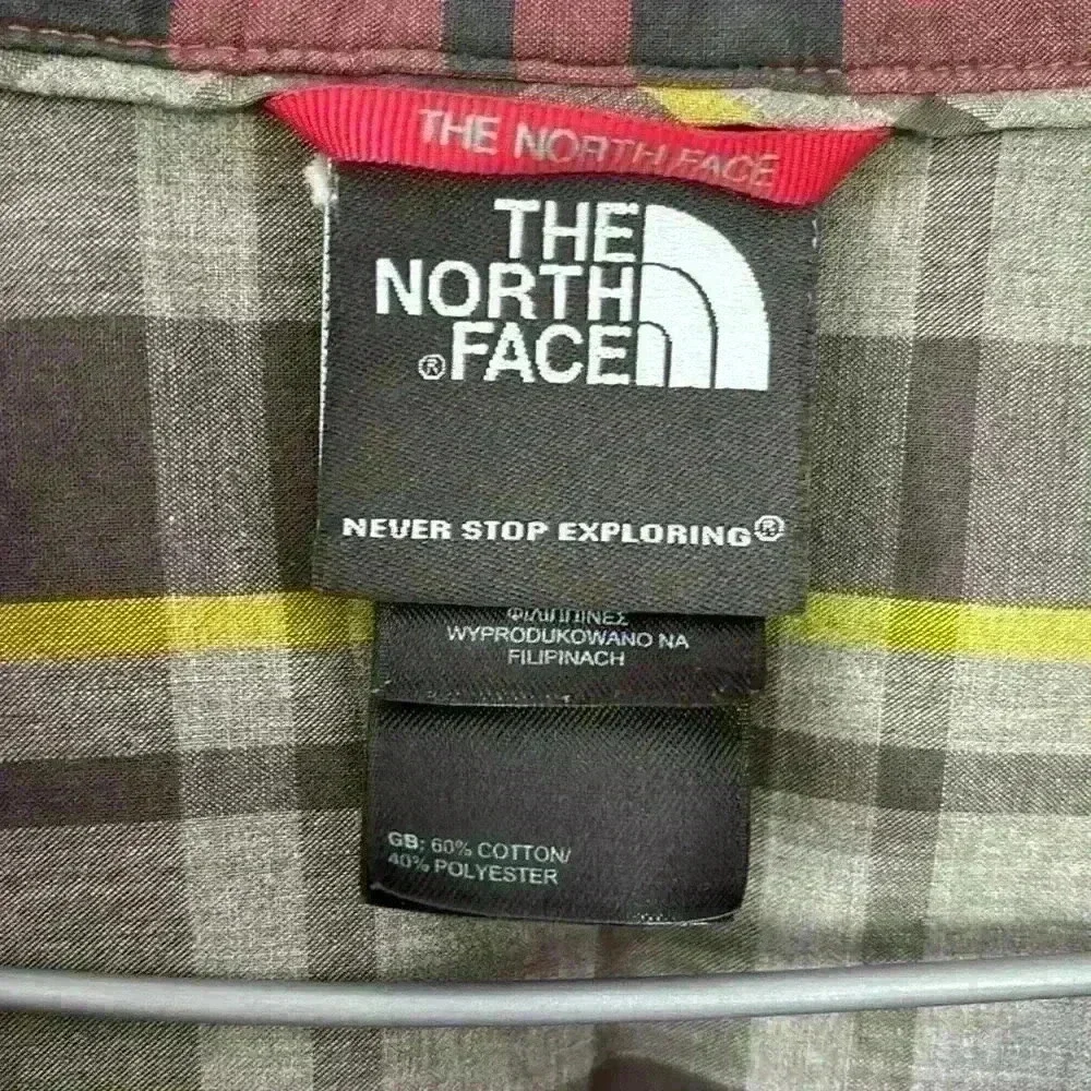 The North Face collared plaid men’s button front shirt